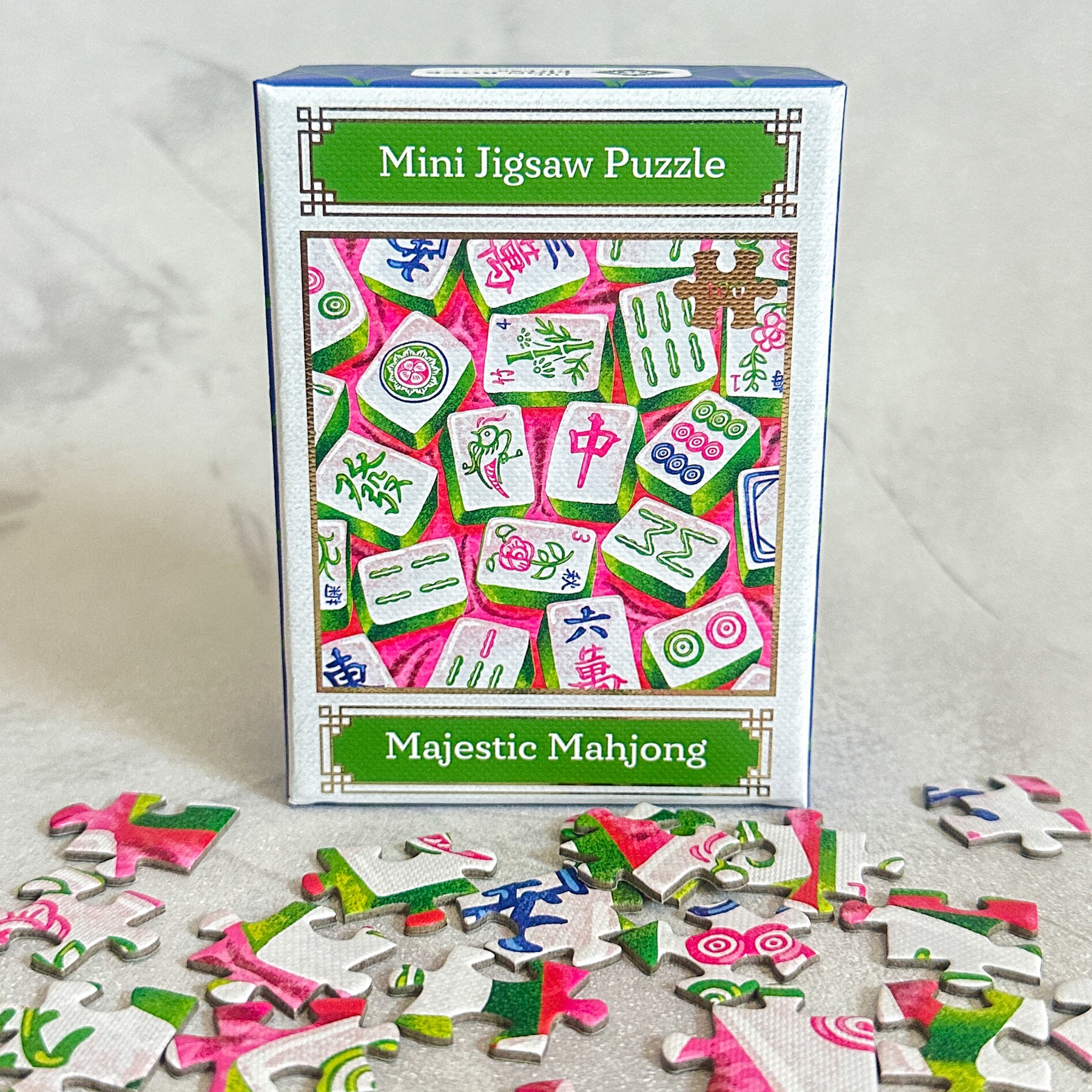 Majestic Mahjong mini jigsaw puzzle set with packaging on a light background